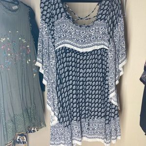 Free People white and navy mini dress with bell sleeves.